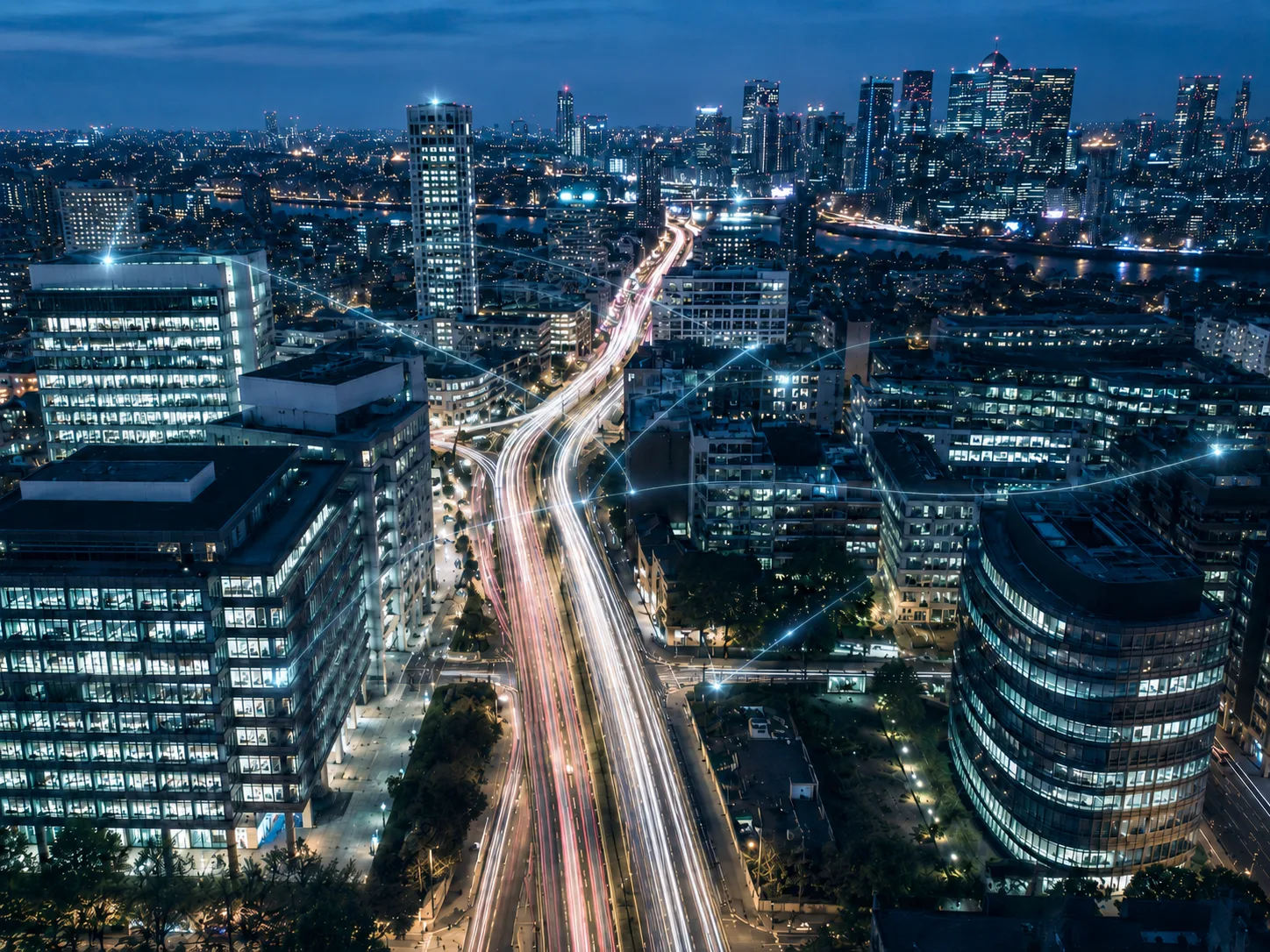 AI strategy recruitment: recruiters who find the leaders to set your AI agenda, shown as data streams flowing through a night city.